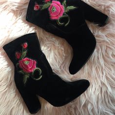 Floral Embroidered Ankle Boot Spring Floral Embroidered Closed Toe Boots, Spring Floral Embroidery Closed Toe Boots, Embroidered High Heel Boots For Spring, Spring High Heel Boots With Floral Embroidery, Black Boots With Floral Embroidery For Fall, Black Floral Embroidery Boots For Fall, Party Boots With Floral Embroidery And Round Toe, Casual Black Embroidered Boots, Embroidered Summer Party Boots