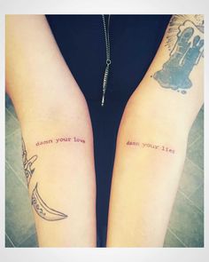 two people with tattoos on their arms that say, damn your love and damn your life