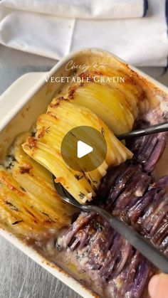 a person cutting up some food on top of a plate