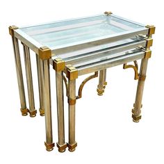 three brass and glass nesting tables