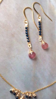 Indigo blue & pink Sapphire earrings and necklace. These earrings and necklace are made with faceted bright pink Sapphire teardrops carefully hand wrapped with fine 28 gauge gold wire. Accented with delicate 2mm genuine deep blue Sapphire faceted beads. Available for purchase individually or as a set. Pink Faceted Beads Jewelry For Everyday, Everyday Pink Faceted Beads Jewelry, Everyday Pink Jewelry With Faceted Beads, Pink Teardrop Minimalist Jewelry, Pink Sapphire Earrings, Ethiopian Opal Necklace, Smoky Quartz Ring, Earrings And Necklace, Minimalist Gifts