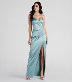 Show off your fab figure by slipping into our gorgeous Jolina! Her pretty sheen will have you radiating from every angle, making you look picture-perfect and camera-ready. She features a sleeveless wrap-front V-neckline and a floor-length wrap skirt creating an alluring front slit. Pair her up with some sparkling finishing touches so you can highlight that glow even more!Fit & FeaturesSurplice V-neckline, adjustable spaghetti strapsFloor-length hem, wrap skirt designFront slitLined luxe sati Wrap Skirt Design, Glitter Prom Dresses, Skirt Satin, Short Summer Dresses, Sequin Prom Dresses, Prom Dress Shopping, Green Prom Dress, Satin Prom Dress, Pink Prom Dresses