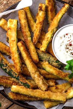 fried french fries with dipping sauce on the side