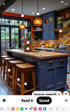 a kitchen with blue cabinets and wooden stools