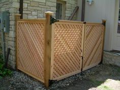 a wooden fence is in front of a house