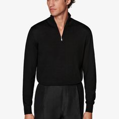 Step out in refined comfort with this soft black sweater; featuring a slim-tailored profile, gently ribbed cuffs and hem, and a half-zip closure that closes into a mock-neck collar. Elegant Black Turtleneck With Ribbed Cuffs, Formal Black Top With Ribbed Collar, Classic Half-zip Sweater With Ribbed Collar, Classic Polo Sweater With Half-zip And Ribbed Collar, Classic Half-zip Polo Sweater With Ribbed Collar, Classic Half-zip Sweater With Ribbed Cuffs, Classic Half-zip Polo Sweater With Ribbed Cuffs, Elegant Black Polo Sweater For Formal Occasions, Elegant Black Formal Polo Sweater