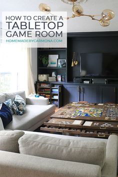 a living room filled with furniture and a flat screen tv on top of a wooden table