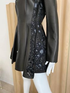 For Sale on 1stDibs - Beautiful Christian Dior by John Galliano Black leather peplum jacket with lace. zipper. Size 4-6 US/ F38 /42Italian