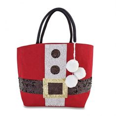 a red and white handbag with pom poms on the front, decorated with silver sequins