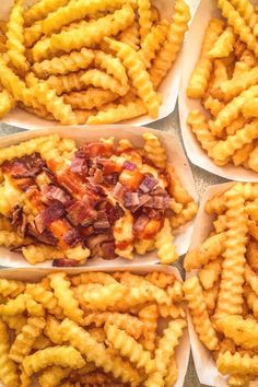 several trays filled with different types of food