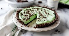 a chocolate and mint pie on a white plate