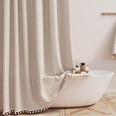 a bathroom with a bathtub and shower curtain