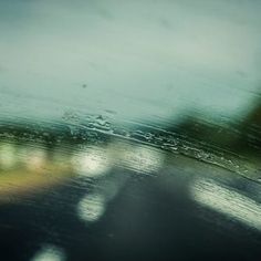 rain drops on the windshield of a car