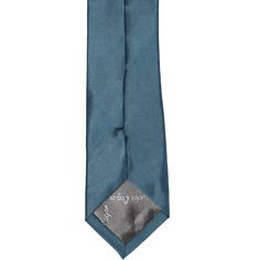 Get ready to be mesmerized by this loch blue tie. This tie is popular for weddings, thanks to its dusty blue and jewel-tone combination. The color pairs with black, gray and navy blue suits. We suggest a fitted suit to go along with the slim width. Speaking of the size, this tie is trimmed down at 2.5-inches wide. While certainly a skinny tie, it's not our skinniest size. A great in-between width that's modern and fashionable. The length is a standard 57-inches. We made it from durable polyester Grey And Navy Blue Suit, Navy Blue Suits, Dark Dusty Blue, Dusty Blue Color, Blue Suits, Color Pairs, Blue Necktie, Slim Tie, Ties For Men