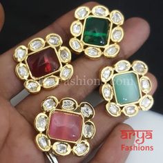 Square Kundan Stud Earrings with colored stones Very Elegant and stylish, these earrings can be paired with any traditional Indian or Western Attire depending upon the occasion and the theme. Made in Brass Gold Finish and colored stones Premium Quality Kundan Studs Length: Approx 1.15" Width: Approx 1.15" Light-weight Push-Back closure Gold Finish on high-quality brass as the base metal In-stock & ready-to-ship **Color may vary slightly due to photography and lighting. Kundan Studs, Colored Stones, Brass Gold, Traditional Indian, Base Metal, Gold Finish, Mint Green, Colored Diamonds, Stone Color