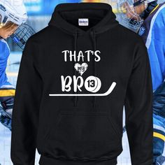 That's My Bro Hockey Sister Hoodie, Hockey Brother Personalized Hockey Hoodie, Hockey Sibling Hoodie.  You can add the player number on the puck at checkout.    To add a name and/or number on the back, use this listing: http://etsy.me/2nmCJd9 See our other hockey items in our shop: https://etsy.me/1PsA7Wo SIZING -------------------- We feel these hoodies are true to size, but please see the size chart in the photos.  We send our apologies but each shirts is made to order so we can't accept returns if the wrong size is ordered. PERSONALIZATION --------------------------- You can add a name OR number on the sleeve at no extra charge.  List the name or number in personalization.   SHIPPING -------------------- Each item is made to order. We generally ship in 3-5 business days, but please see Black Hooded Sweatshirt Gift, Black Hooded Sweatshirt As Gift, Black Sweatshirt Winter Gift, Hooded Winter Hoodie As Gift, Hooded Winter Sweatshirt Gift, Winter Gift Hooded Hoodie, Winter Gift Hooded Sweatshirt, Winter Hooded Hoodie As Gift, Winter Hoodie In Cotton As Gift