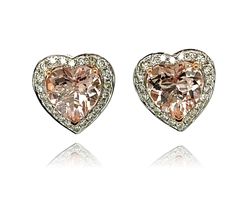 These adorable Heart shaped Morganite stud earrings have a halo of shimmering diamonds around them. The center stone has three prong setting in Rose gold for the perfect accent. There is a double push lock closure for extra security. These earrings come in a beautiful box ready for the perfect gift! 14KW:                    3.75 gms Morganite wt:     4.56 cts, heart shape Diam wt:              0.63 cts Diam stones:       116 round, brilliant cut, Color: I, Clarity SI Free shipping within the US! Usually ships within 1-2 business days Retail value: $4,350 Hassle free 14 day return policy...No questions asked! Morganite Earrings, Pink Heart Earrings, Morganite Diamond, Rose Gold Heart, Heart Shaped Earrings, Diamond Stud Earrings, Diamond Stud, Morganite, Diamond Earrings Studs