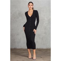 Enhance Your Style With Our Black Button Front Bodycon Dress, Available In Sizes S, M, And L. This Dress Features A Button Front, A V Neckline, And Long Sleeves With Thumbholes For A Chic And Contemporary Look. Crafted From A Premium Blend Of 43% Viscose, 42% Polyester, And 15% Nylon, This Dress Offers A Perfect Combination Of Comfort And Sophistication. Key Features: 1. Fabric: Made From 43% Viscose, 42% Polyester, And 15% Nylon, Our Bodycon Dress Provides A Soft And Luxurious Feel, Ensuring A