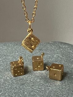 This little lucky dice is  a recycled brass dice made in the uk  The perfect gift , this little dice measure 0.8cm X0;8 cm, a sweet pendant  This charm is sold alone , or with  a simple chain 60cm British made. Tiny Gold Charms For Gifts, Tiny Gold Charms As Gifts, Small Brass Jewelry Gift, Dice Keychain, Dice Jewelry, Simple Chain, Girls Frontline, Gold Gift, Brass Charms