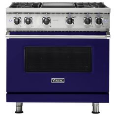 a blue stove with four burners and two ovens on it's sides