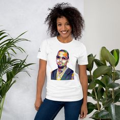 Introducing the Chris Brown T-shirt! 🎤👕 This stylish tee features a bold design inspired by Chris Brown's electrifying performances. It's perfect for fans who want to show their love for the music legend. 🕺🏽🎶 Grab yours today and rock the look wherever you go! • 100% combed and ring-spun cotton (Heather colors contain polyester) • Fabric weight: 4.2 oz./yd.² (142 g/m²) • Pre-shrunk fabric • Side-seamed construction • Shoulder-to-shoulder taping • Blank product sourced from Nicaragua, Mexico Fitted Music-themed Streetwear T-shirt, Fitted Music-themed T-shirt For Streetwear, Music-themed Short Sleeve T-shirt For Streetwear, Fitted Pop Culture T-shirt For Streetwear, Brown T Shirt, Brown Tshirt, Neo Soul, Pop Collection, Heather White