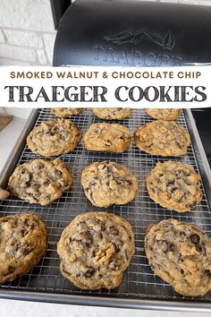 chocolate chip cookies cooling on a grill with the words smoked walnut and chocolate chip traeger cookies