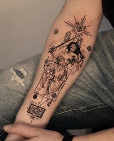 a person with a tattoo on their arm