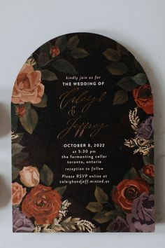 a wedding card with flowers on it