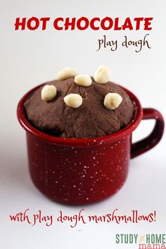 there is a red cup with chocolate pudding in it and the words hot chocolate play dough