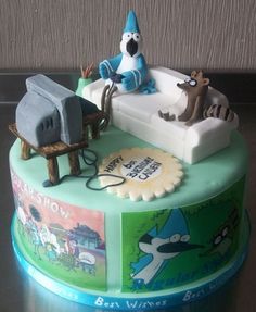 a birthday cake with an image of the smurfs and cat in the hat on it