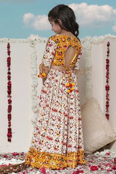 VASTRAMAY Girls' Yellow & Cream Patola Print Lehenga Set Dress your girl up in style with this adorable lehenga set featuring a beautiful Patola print crop top and a matching skirt. Crafted from rayon for comfortable wear, this set is perfect for special occasions and festive celebrations. Key Features Yellow and cream Patola print Crop top with round neck and half sleeves Rayon material for comfort Specifications Sleeve Length: Short Material & Care Material: Rayon Care Instructions: Refer to g Yellow Cotton Lehenga With Pallu, White Patola Lehenga, Luxury Yellow Bandhani Print Lehenga, Yellow Floral Print Lehenga For Navratri, Floral Print Yellow Lehenga, Yellow Cream, Sleeveless Jacket, Print Crop Tops, Girls Wear