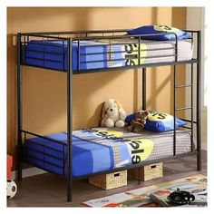 a bunk bed with two sets of blue mattresses and a teddy bear on the bottom