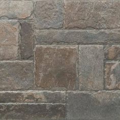 a close up view of a stone wall