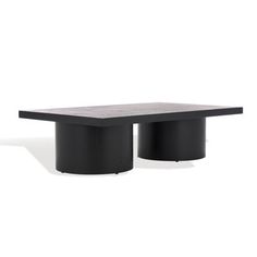 a table with two black pedestals on it