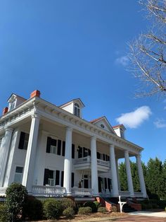 a large white house with columns on the front