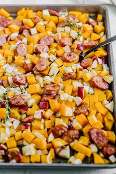 a pan filled with lots of different types of food