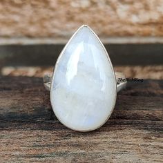 Welcome to my shop, Pear moonstone ring, rainbow moonstone ring, solid 925 sterling silver ring, moonstone ring, white moonstone ring, silver ring. Thanks for visiting my shop. Handmade Moonstone Teardrop Ring, Silver Teardrop Moonstone Ring, Handmade White Moonstone Ring In Sterling Silver, Handmade White Moonstone Sterling Silver Ring, White Moonstone Birthstone Ring For Promise, Spiritual Moonstone Ring Stamped 925, Handmade White Moonstone Crystal Ring, White Teardrop Moonstone Ring In Sterling Silver, White Moonstone Spiritual Ring