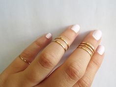 Gold knuckle rings Gold Stackable Rings With Open Band Design, Gold Stackable Rings With Simple Open Band Design, Adjustable Gold Stackable Rings With Simple Design, Adjustable Simple Gold Stackable Rings, Dainty Gold Stackable Rings With Open Band, Gold Stackable Midi Rings With Open Band, Gold Stackable Open Band Midi Rings, Gold Midi Rings With Simple Design For Wedding, Simple Gold Midi Rings For Wedding