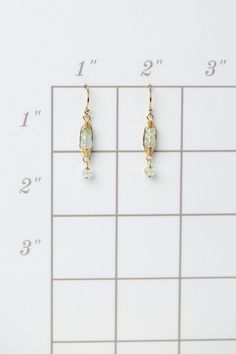 A beautiful gift for those born in March, featuring their birthstone of stunning aquamarine that is hand wrapped in a gold filled herringbone weave. These feminine earrings dangle from gold filled earwires. Gold Filled (lead and nickel free) Aquamarine 1.25", on gold filled earwires We hand select our natural materials, thus there may be slight variations in color and/or size that will not detract from the overall aesthetic Our unique handcrafted designer jewelry for women is made in America, wi Gold Aquamarine Teardrop Jewelry, Gold Aquamarine Drop Earrings, Dainty Aquamarine Gold Jewelry, 14k Gold Filled Birthstone Teardrop Earrings, Gold Aquamarine Briolette Jewelry, Herringbone Earrings, Born In March, Feminine Earrings, March Born