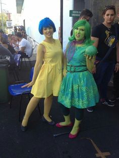 two people in costumes standing next to each other