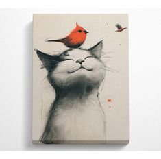 a red bird sitting on top of a white cat's head with its eyes closed