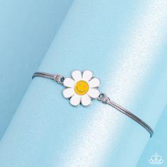 Item #P9DA-SVXX-213XX Held together and centered within soft gray cording, a single daisy charm rests. Featuring a silver smiley face in its yellow center, this single flower provides a fashionably, minimalistic statement around the wrist. Features an adjustable sliding knot closure. Sold as one individual bracelet. Paparazzi Accessories Slip Knot Bracelets, Sliding Knot Closure, Daisy Charm, Adjustable Knot, Daisy Bracelet, Mixed Metal Jewelry, Jewelry Bracelets Silver, Minimalistic Style, Holiday Sparkle