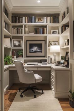 a home office with built in bookshelves and desk