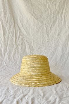 Round-shaped straw hat, with a short brim and a deep round head design, is made in the traditional technique that consists of braiding strands of rye straw. Handmade in northern Portugal. Straw hats suitable for children, made with thinner straw. Inner sweatband included on baby sizes. -- Please, leave your kid's head measurement on your order notes so that I can ship you a hat that will fit better!  Check your kid's size by measuring with bias tape around the head, by the forehead. Leave the he Handwoven Straw Bucket Hat With Short Brim, Handwoven Short Brim Straw Bucket Hat, Adjustable Natural Cloche Hat With Flat Brim, Adjustable Natural Flat Brim Cloche Hat, Natural Straw Hat One Size Fits Most, Natural Straw Bucket Hat With Flat Brim, Adjustable Brimmed Bucket Hat In Natural, Adjustable Short Brim Natural Bucket Hat, Natural Brimmed Boater Hat