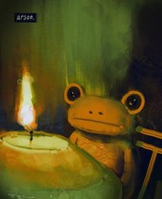 a frog sitting in front of a cake with a lit candle on top of it