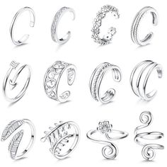 PRICES MAY VARY. 🌴Adjustable Toe Rings Set-- You will get 12pcs different style toe rings in one order. Arrow toe ring, flower toe ring, heart toe ring, simple band ring, cubic zirconia toe ring and leaf toe ring included. Classic and fashionable styles that will never go out of style, perfect to wear it on the beach, party and wear as daily jewelry. 🍍Safe Material-- These open toe rings are made of high quality copper, high resistance to rust and tarnish, more durable; shiny surface with poli Flower Arrow, Rings Summer, Beach Toes, Rings For Women Gold, Toe Ring Designs, Simple Band, Daily Jewelry, Knuckle Rings, Foot Jewelry