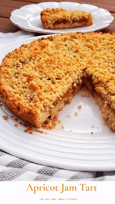 a piece of cake on a white plate with the words apricot jam tart