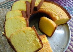 a bundt cake with slices cut out on a plate