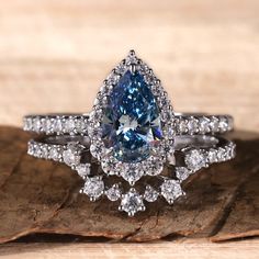 lab grown diamond engagement ring Blue Diamond Wedding Ring, Curved Wedding Ring, Magic Academy, Sparkling Wedding, Wedding Ring Sets Unique, Best Anniversary Gifts, Blue Engagement Ring, Diamond City, Ring Toss