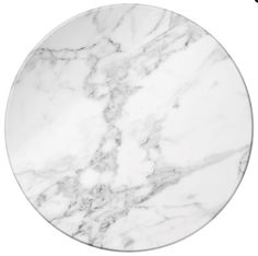 a white marble plate on a white background